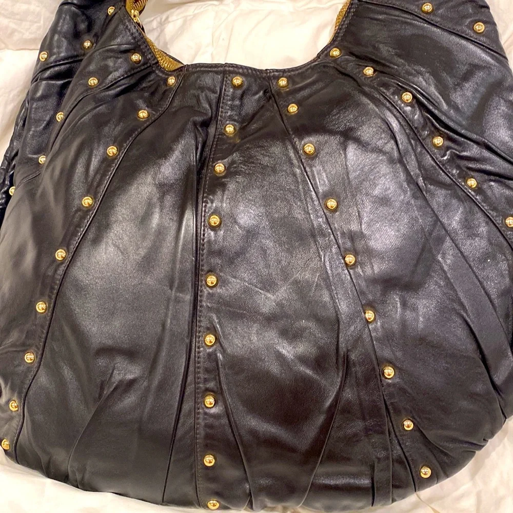 GOLDENBLEU black leather purse semi circular bag with gold tone studs all over
